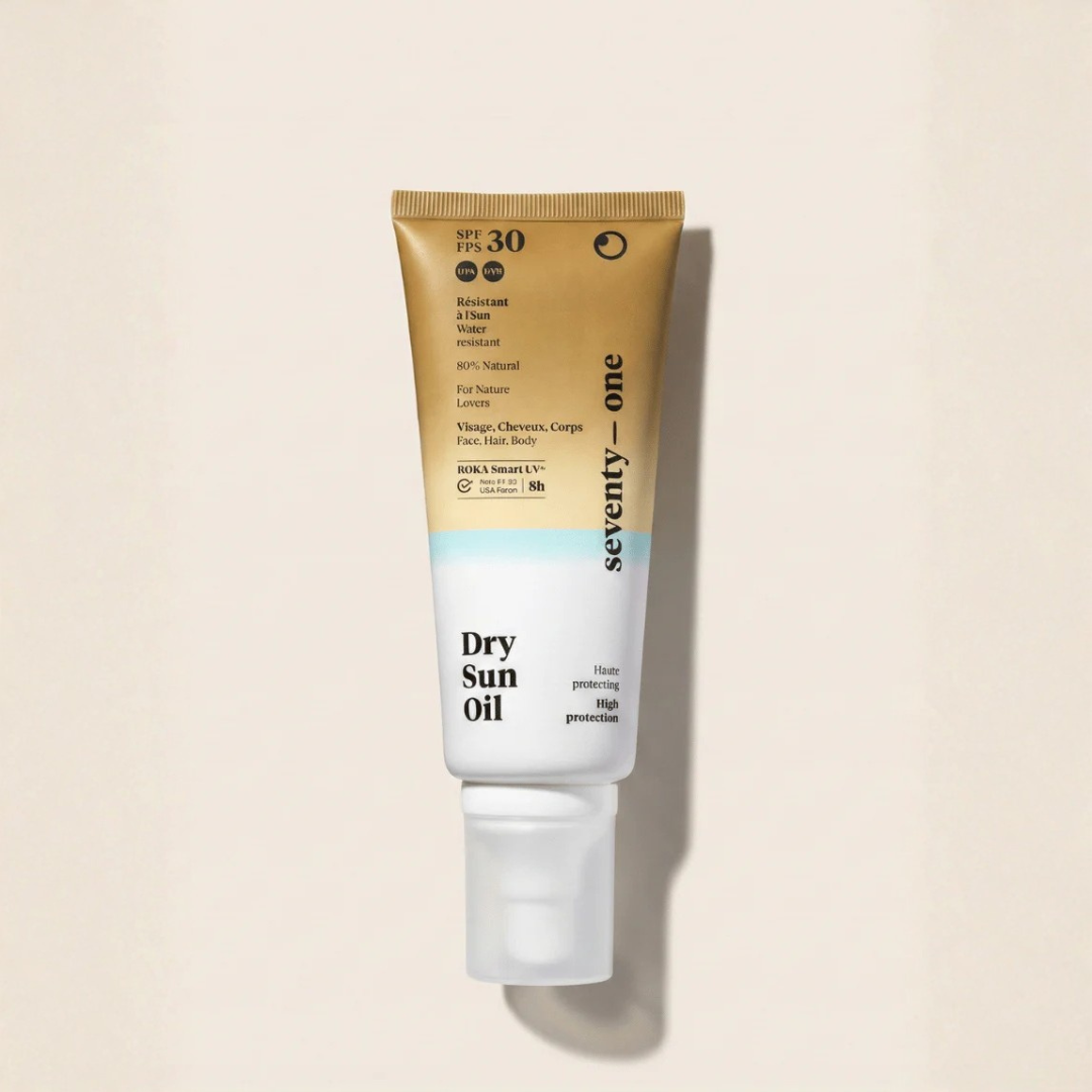 Tube of seventy-one Dry Sun Oil on a beige background