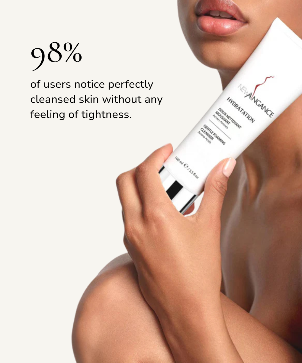 Person holding a skincare product with text about user feedback on skin cleansing.