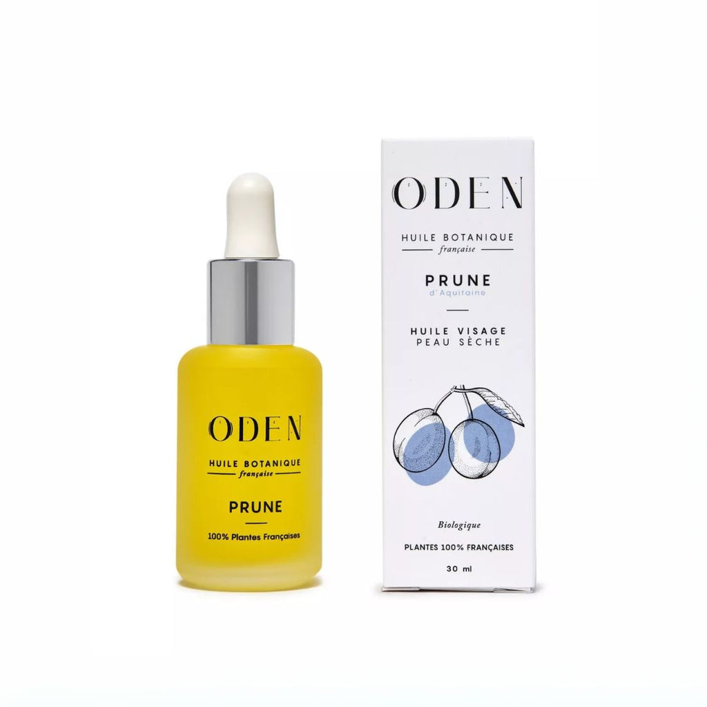 Yellow bottle with dropper and white cap, next to a white box labeled 'ODEN Prune' on a white background.