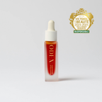 Skincare dropper bottle with 'ODEN' branding on a white background, featuring a gold award logo.