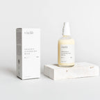 vielo organic cleansing milk bottle and packaging on a light background
