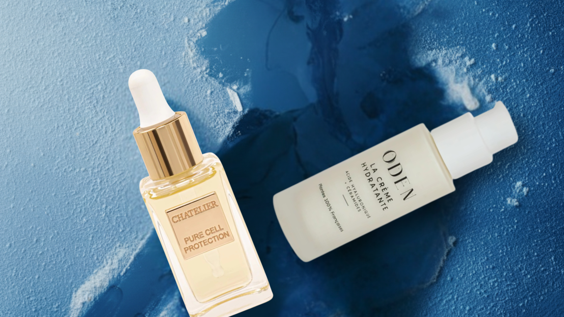 Two skincare products on a blue textured background